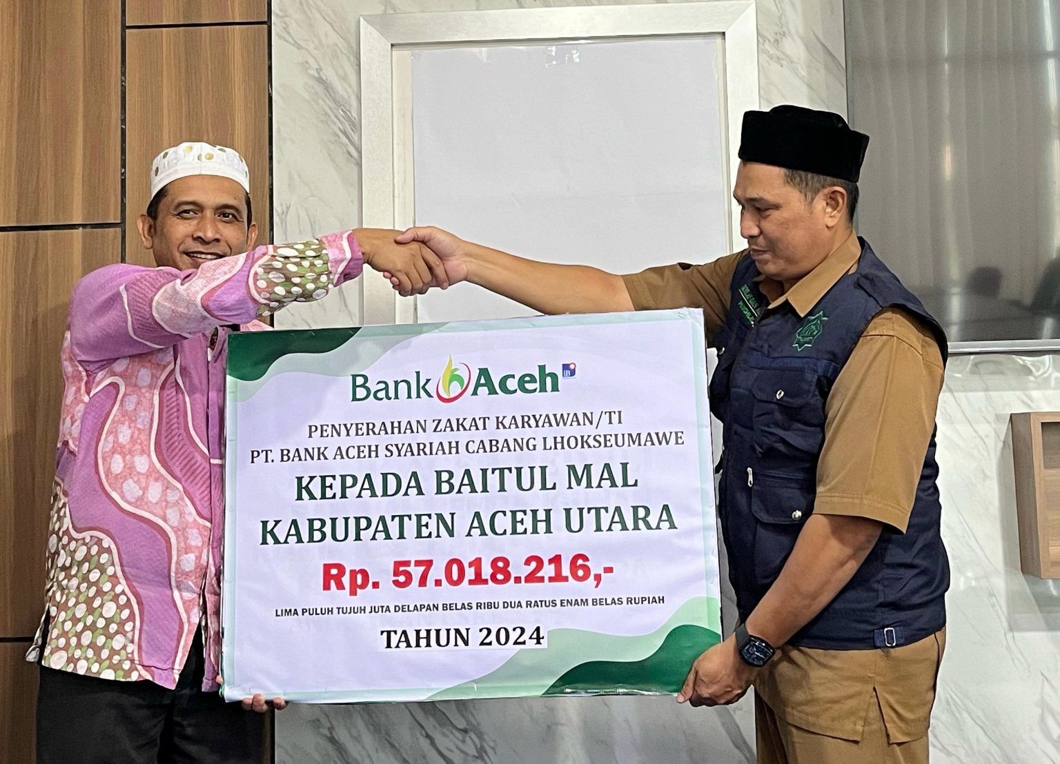 Bank Aceh Syariah Serahkan Rp 57 Juta Zakat Karyawan ke Baitul Mal Aceh Utara